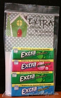 three packages of extra chewing sitting on top of a table