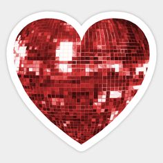 a red heart shaped sticker with squares on it's surface, in the shape of a disco ball