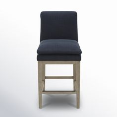 an upholstered bar stool with a dark blue fabric seat and wooden frame, viewed from the front