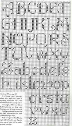 the cross stitch alphabet is shown in pink and white, with an arrow on it