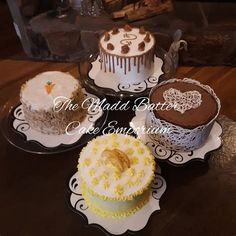 four different cakes on plates sitting on a table with the words, the bread betteries are surrounded by other desserts