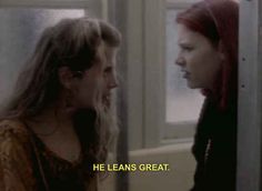 two women standing next to each other in front of a window with the words he learns great