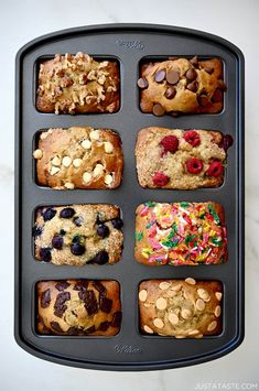 a muffin tray filled with different types of baked goods