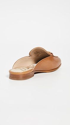 Sam Edelman Linnie Mules | SHOPBOP Classic Leather Footbed Slip-on Slippers, Elegant Brown Slip-on Slippers, Workwear Almond Toe Slip-ons With Leather Footbed, Workwear Slip-ons With Leather Footbed And Almond Toe, Office Slip-ons With Cushioned Footbed And Closed Toe, Office Slip-ons With Cushioned Footbed, Office Cushioned Footbed Closed Toe Slip-ons, Flat Slip-ons With Stitched Sole For Work, Classic Slip-on Mules With Stitched Sole