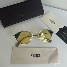 Brand New Yellow Sunglasses With Mirrored Lenses For Formal Occasions, Elegant Yellow Sunglasses For Party, Formal Yellow Sunglasses With Mirrored Lenses, Elegant Yellow Party Sunglasses, Elegant Yellow Sunglasses With Gradient Lenses, Luxury Yellow Sunglasses With Mirrored Lenses, Modern Yellow Cat Eye Sunglasses, Fendi Sunglasses Men, Luxury Yellow Sunglasses With Gradient Lenses