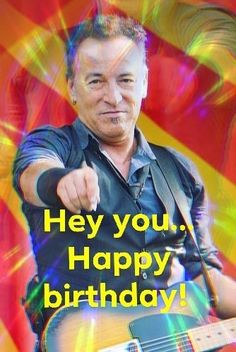 a man holding a guitar and pointing at the camera with an happy birthday message in front of him