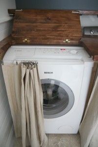 a washer and dryer in a small room