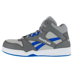 The Reebok Men's High Top Composite Toe Work Sneaker RB4135 is a basketball-inspired style perfect for on-the-job protection while bringing a timeless style to the office. The upper is mesh and leather for a durable, comfortable pair of sneakers. It features a moisture-wicking nylon mesh lining for breathability and a memory foam removable cushion footbed for a luxurious feel. Plus, these sneakers are slip-resistant and 100% non-metallic, with XTR® Brand Composite Toe and dual resistor (SD 10) t Reebok High Tops, Work Sneakers, Mens High Tops, Cobalt Blue, Timeless Style, High Top, Cobalt, Moisture Wicking, High Tops