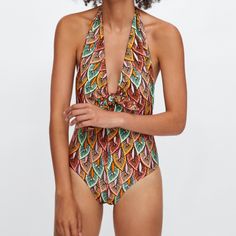 New With Tag Zara Leaf Print Swimsuit Printed Swimsuit With Plunge Neckline And Tie Halter. Contrasting Inner Lining. Model Height: 5’10” Printed Halter Neck Bodysuit For Poolside, Printed Halter Neck Bodysuit For Beach Season, Printed Halter Neck Swimwear For Party, Chic Zara Swimwear For Vacation, Chic Zara Swimwear, Zara One-piece Swimwear For Pool, Chic Zara Swimwear With Lined Body, Zara One-piece Swimwear For Vacation, Zara One-piece Bodysuit For Beach