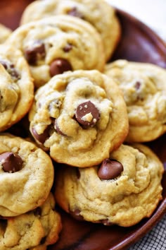 a plate full of chocolate chip cookies on a table