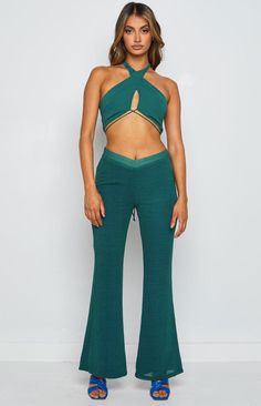 * Teal Pants  
 * The ultimate pants () to look both trendy and cute in! Pair these flares with the Clifford halter top () as a set or a crop () of your choice. 
 *  
 * V front  
 * Side invisible zip  
 * Full length  
 * Lined  
 * Light-weight material with no stretch  
 * Flare leg Teal Pants, Prom Midi Dress, Shop Pants, Summer Playsuit, Beginning Boutique, Strapless Tops, Crop Top Sweater, Invisible Zip, One Shoulder Tops