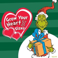 the grinch is holding a box with a heart on it