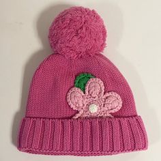 Children's Place Flower Knit Hat Color: Pink Material: 60% Cotton 40% Acrylic Details: - Knit Flower Decor - Fleece Lined - New Without Tags Playful Pink Crochet Hat For Winter, Adjustable Pink Beanie For Spring, Warm Pink Knit Hat, Flower Knit, Knitted Flowers, Flower Decor, Knit Hat, Childrens Place, Pink Flower