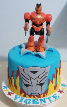 a birthday cake with an image of a robot from the movie's tv series