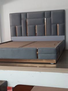 a bed that is sitting on top of a table