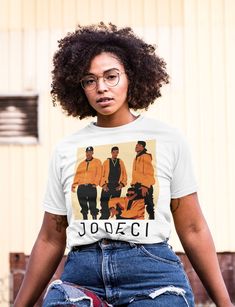 Jodeci Shirt 90's R&B Unisex Jersey Short Sleeve Tee Jodeci Tee For Music Lover 90s Summer Fest Tshirt For Jodeci Concert Throwback Vibes Jodeci is an American R&B quartet consisting of members DeVanté Swing, Mr. Dalvin, K-Ci, and JoJo. Also known as the Bad Boys of R&B. This classic unisex jersey short sleeve tee fits like a well-loved favorite. Soft cotton and quality print make users fall in love with it over and over again. These t-shirts have-ribbed knit collars to bolster shaping. The shoulders have taping for better fit over time. Dual side seams hold the garment's shape for longer.  .: 100% Airlume combed and ringspun cotton (fiber content may vary for different colors) .: Light fabric (4.2 oz/yd² (142 g/m .: Retail fit .: Tear away label .: Runs true to size Jodeci Concert Outfit, 90s Inspired T-shirt With Letter Print For Concert, 90s Inspired Concert T-shirt With Letter Print, 90s Inspired Streetwear T-shirt With Screen Print, 90s Inspired Short Sleeve T-shirt For Concert, 90s Inspired Printed Tops For Streetwear, Mr Dalvin, 90s Summer, Summer Fest