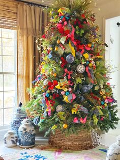 a decorated christmas tree in a living room