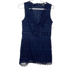 Lulu’s Take Me Dancing Navy Blue Crochet Lace Sleeveless Mini Dress Nwt, Size M This Trendy Dress Is Crafted From Crochet Lace In An Intricate Geometric Design, Perfect For A Summertime Party. Crochet Construction V-Neckline Wide Tank Straps Darted Bodice Sheath Silhouette Hidden Back Zipper/Clasp Lined Body And Lining 100% Polyester Measured Flat: Pit To Pit 17” Length 32” Blue Lace Sleeveless Mini Dress, Blue Lace Sleeveless Dress, Navy Blue Sequin Dress, Crochet Construction, White Lace Bodycon Dress, Navy Blue Crochet, White Lace Bodycon, Long Sleeve Babydoll Dress, Spaghetti Strap Bodycon Dress