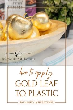 gold foiled apples in a bowl with text overlay how to apply gold leaf to plastic