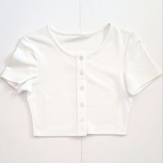 Short Sleeve Button Down Crop Top, Fresh Bright White, Perfect Addition To Your Wardrobe See Images For Measurements And Conditionno Size Tag, I Say M/L, Use Measurements For Size Reference Ask Questions! Make Me An Offer Bundle To Save! All Packages Are Mailed In Recycled Materials No Trades, Refunds, Returns- All Sales Are Final! Button Down Crop Top, Button Crop Top, White Crop, Recycled Materials, Size Tag, Bright White, Chef, Crop Top, Womens Tops