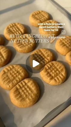 some cookies that are sitting on top of a sheet of wax paper with the words keto and ingredient, nutter butters