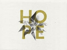 the word hope is made up of leaves and letters that appear to be painted gold