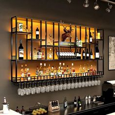 a bar with many bottles and glasses on it