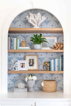 Arched bookcase with oak shelves and accessories Wallpaper Bookcase, Wallpaper Bookshelf, Best Blue Paint Colors, Kitchen Remodel Plans, Wallpaper Shelves, Blue Paint Colors