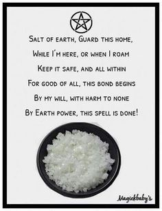 a black bowl filled with salt next to a white sign that says salt of earth, guard this home