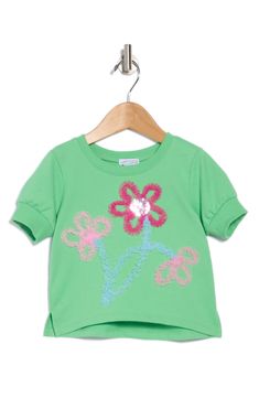 Adorable soutche flowers centered with sequins add a touch of charm to this kid-approved top cut from lightweight knit fabric. 60% cotton, 40% polyester Machine wash, tumble dry Imported Spring Casual T-shirt With Floral Applique, Playful Cotton T-shirt For Spring, Cute Embroidered Graphic Tops For Spring, Playful Green Spring T-shirt, Cute Embroidered Spring Tops, Cute Embroidered Tops For Spring, Cute Green Embroidered Tops, Playful Embroidered Crew Neck Top, Playful Green Tops For Spring