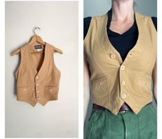 Vintage '80s vest in a wonderful tan. *length down front: 21"- 18" down the back *chest: 34"- model has a 35" bust- this best fits a true 34" or less- 33" would probably fit perfectly *waist: 29" *all cotton *2 pockets, leather buckle in back Great for layering! Medium weight- gorgeous wear. *all sales final* Light Academia Aesthetic, Corset Fashion, Cotton Vest, Academia Aesthetic, Light Academia, Vest Outfits, Leather Buckle, Style Board, Womens Vest