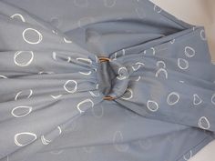 an open umbrella with white circles on it