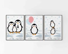 three penguins are standing in the snow and one penguin is holding a red balloon while another penguin