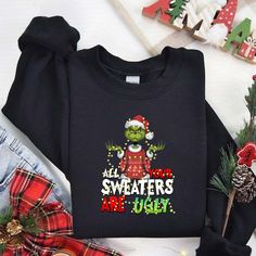 an ugly christmas sweater with the words sweatters are ugly on it