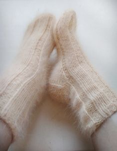 DESCRIPTION: Angora extra fluffy, soft ribbed unisex socks.  CARE INSTRUCTIONS: gentle hand wash Dry flat No tumble dry No iron No dry cleaning Thank you for visiting my shop! Didn't find what you were looking for? You can shop more styles here: https://www.etsy.com/shop/MishkaKnitwear?ref=simple-shop-header-name&listing_id=767678511&section_id=27800266 I gladly accept custom orders, please contact me on my shop or personal page. Comfortable Knitted Cream Socks, Comfortable Cream Knitted Socks, Angora Socks, Handknit Socks, Socks Outfit, Socks Aesthetic, Hand Knits, Luxury Socks, Handmade Socks