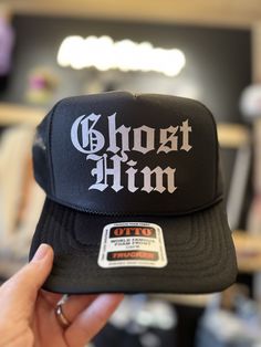 Add a touch of humor to your wardrobe with our Ghost Him Black Trucker Hat. This traditional foam trucker hat features a "Ghost Him" graphic on the front, perfect for those with a playful sense of humor. The mesh back and adjustable back ensure a comfortable fit for all head sizes. Trucker Hat Sayings, Hat Sayings, Cricut Clothes, Random Products, Tee Ideas, Cricut Shirts, Black Trucker Hat, Crazy Hats