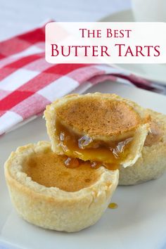 the best butter tarts on a plate with a red and white checkered table cloth