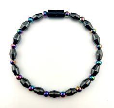 Enhance your style and reap the benefits of magnetic therapy with our stunning Magnetic Therapy Rainbow and Black Hematite Anklet. Suitable for both men and women, this stylish anklet is crafted with High Quality AAA Grade Magnetic Hematite for strength, 90lb Extra Strength Copolymer Craft Line for durability, and High Strength Magnetic Clasps for easy wear. At our brand, strength is a top priority, which is why most of our designs are entirely magnetic. Although, we also offer some designs feat Black Magnetic Hematite Bracelet, Black Hematite Magnetic Bracelets, Black Hematite Magnetic Bracelet, Black Magnetic Hematite Bracelets, Sewing Tape Measure, Magnetic Therapy, Ankle Bracelet, Ankle Bones, Anklet Jewelry