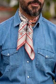 This floral pattern with hand-rolled hems will give your look an elegant twist. This scarf is a testament to timeless craftsmanship, a blend of care, and passion. The classic neckerchief size: Approx. 27" x 27". A comfortably large size that fits most men, unlike smaller bandanas. 100% silk twill: A soft, silky fabric traditionally used in men's tailoring for its look and its drape. Characterized by a diagonal weave which makes it very durable. Hand rolled hems: For the ultimate in luxury and so Silk Bandana Outfit Men, Classic Silk Scarf For Gift, Classic Silk Neckwear With Pocket Square, Men Wearing Silk Scarves, Men's Silk Scarf, Luxury Silk Scarf For Men, Men’s Silk Scarf Fashion, Large Silk Scarf, Silky Fabric