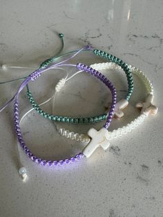 White Braided Adjustable Beaded Bracelets, White Braided Jewelry For Friendship, White Braided Beaded Bracelets As Gift, Adjustable White Friendship Bracelets, White Braided Bracelets With Sliding Knot Nylon Cord, White Braided Bracelet With Sliding Knot Nylon Cord, Adjustable White Nylon Cord Friendship Bracelets, White Braided Bracelets With Adjustable Length, White Braided Nylon Cord Bracelet With Adjustable Length