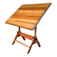 a wooden table with two legs and a board on it's top that is attached to a stand