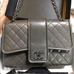 New With Tags (Not Attached) Grey Chanel Flap Bag. Used 3-4 Times. Comes With Box, Bag, Authenticity Card, And Receipt. Bought From Chanel At Saks In St Louis. Price Is Firm. No Trades! Luxury Office Bag With Double Flap, Luxury Flap Bag With Removable Pouch For Shopping, Luxury Satchel Flap Bag With Original Box, High-end Double Flap Shoulder Bag With Removable Pouch, High-end Bag With Detachable Strap And Double Flap, High-end Double Flap Bag With Detachable Strap, High-end Shoulder Bag With Double Flap And Removable Pouch, High-end Shoulder Bag With Removable Pouch And Double Flap, High-end Double Flap Shopping Bags