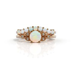 Set Opal engagement ring opal and diamond October birthstone 14k rose gold gold 2mm Matching Wedding Band Women White opal engagement ring with lovely diamonds, set in 14k solid gold. ► FEATURES; Gemstones: natural opal : 9 x2mm opal Gemstones: natural opal : 5mm , diamond: 6x1 mm total diamond carat weight: 0.03 (color H; clarity VS) Material options: 14k rose gold, 14k yellow gold, 14k white gold Size: all ring sizes are available How to Order: Please select your preferred size and material fr White Opal Engagement Ring, Engagement Ring Opal, Opal Diamond Ring, Wedding Band Women, Opal Engagement Ring, White Opal Ring, Turquoise Wedding, Ring Opal, Zierlicher Ring