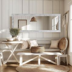 a white bench sitting in front of a mirror on top of a wooden floor next to a table