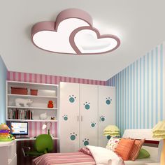 a child's bedroom with pink and white striped walls