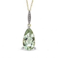 Vintage-inspired, this pendant is a lovely addition to any attire. Fashioned in warm 10K gold, this pendant features a marquise-shaped bale set with shimmering diamond accents. An elegant 15.0 x 8.0mm pear-shaped green quartz drop topped with a single diamond accent suspends freely from this detailed bale. Polished to a brilliant shine, this pendant is displayed along an 18.0-inch rope chain that secures with a spring-ring clasp. Local Jewelry, Green Quartz, Drop Pendant, Quartz Stone, Rope Chain, Diamond Stone, 10k Gold, Necklace Designs, Spring Rings