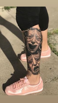 a person with some tattoos on their legs and one has a mask on his face