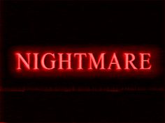 a red neon sign that says nightmares in the middle of it, on a black background