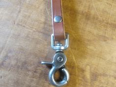 "Please check out my clearance section for deals on everything. I am trying to use up all the leather left over from my belt making. It is 1/2\" wide and when it is doubled up it is 17 inches. It has a choice of snaps for attaching things. It is secured with a chicago screw with threadlock in it so it won't open.I hand make everything in my shop myself, if you need it by a certain date please let me know and I will make sure you have it. From left to right they are Blue Water Buffalo , Gray Wate Work Belt, Leather Lanyard, Fossilized Coral, Handmade Belts, Citrine Jewelry, Beautiful Belts, Citrine Pendant, Veg Tan Leather, Personalized Monogram