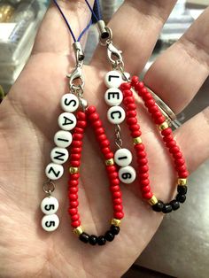 For the love of Charlos! Do you love Charles Leclerc or Carlos Sainz like I do? This phone charm is for you. Get your favorite driver or get them both. A subtle but fun nod to the fandom. This charm is hand made with acrylic and glass beads. They are handmade so each one is different based on the beads. Each charm itself measures approximately 3 inches long. F1 Crafts, Bracelet Craft Diy, Bracelets Design, Diy Bracelet Designs, Beads Bracelet Design, Formula 1 Car, Diy Crafts To Do, Charles Leclerc, Easy Diy Art